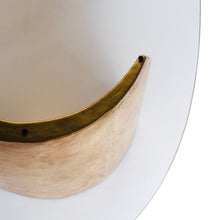 Load image into Gallery viewer, Overhead view of Bangle cast bronze table with tinted glass top.
