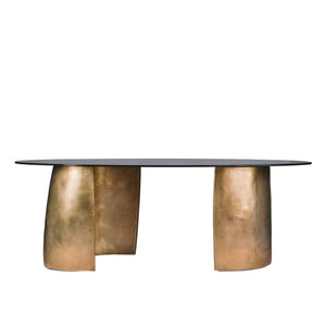 Side view of Bangle cast bronze table with tinted glass top