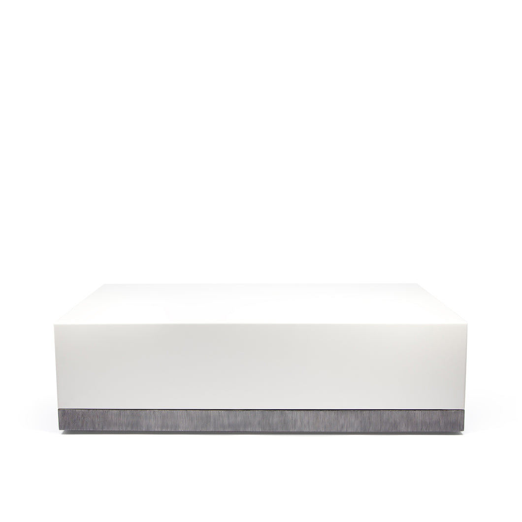 Corian Coffee Table, white corian table with hand textured steel detailing along bottom edge